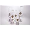 Image 1 : Set of five matching and graduated sized colourless pressed glass oil lamps