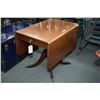 Image 1 : Mid 20th century walnut drop leaf center pedestal table with single drawer and brass capped claw fee