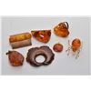 Image 1 : Selection of amber jewellery including brooches, spider pin, ring, pendants etc. plus a petrified wo