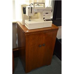 Antique oak sewing machine cabinet plus a a Pfaff Hobbymatic 947 Sewing machine