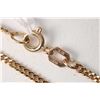 Image 2 : 10kt yellow gold 16" neck chain and a tested 14kt yellow gold Haida killerwhale pendant and matching