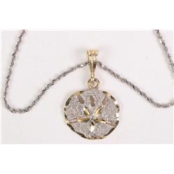 14kt white gold 16" rope chain and a 14kt hewllog gold three dimensional sand dollar pendant. Retail