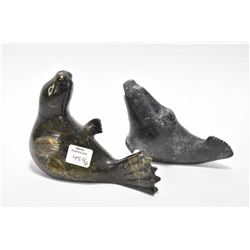 Two soapstone carvings including 6 1/2" seal and a walrus, both signed on underside