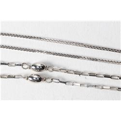 Two 14kt white gold neck chains including 20" curb chain and a 17" neck chain with bead decoration