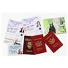 Image 1 : V (American sci-fi series, 2009-2011) - A group of assorted identification cards and passports.