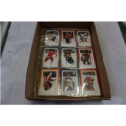 LOT OF HOCKEY STAMPS AND BASKET BALL CARDS