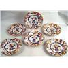 A GROUP OF SIX IMARI PALETTE DINNER PLATES Chips,