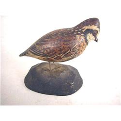 A CARVED AND PAINTED MINIATURE BOB WHITE QUAIL