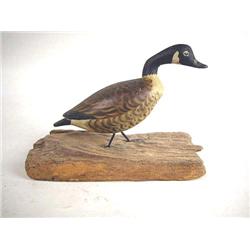 A CARVED AND PAINTED CANADA GOOSE