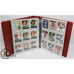BINDER OF ROOKIES AND HOCKEY CARDS