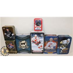 BOX OF HOCKEY TINS.