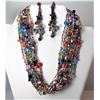 Image 1 : 15)  MULTI COLORED 14 STRAND GLASS,