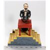 Image 1 : VINTAGE CAST IRON MECHANICAL MAGICIAN COIN BANK.