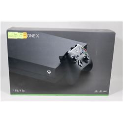 NEW IN BOX  X-BOX ONE 1TB, 4K BLU-RAY INCLUDES