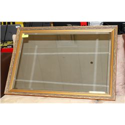 GOLD TONE FRAMED MIRROR 40"X28".