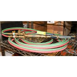 OXYACETYLENE CUTTING TORCH WITH HOSE.