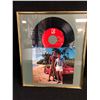 Image 1 : MIKE POST THEME FROM MAGNUM P.I VINYL RECORD (FRAMED)