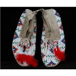 Pair of Sioux Beaded Moccasins with Parfleche