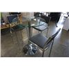 Image 2 : ROUND CHROME AND GLASS BAR HEIGHT TABLE WITH THREE BLACK LEATHER AND CHROME BAR STOOLS
