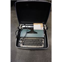 TYPE WRITER IN BLACK CASE