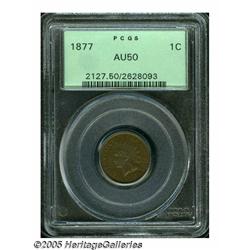 1877 1C AU50 PCGS. Warm light to medium brown sur