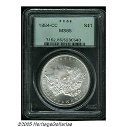 1884-CC S$1 MS65 PCGS. This lovely example is bot