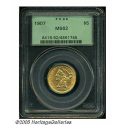 1907 $5 MS62 PCGS. A sharply struck peach-gold ty