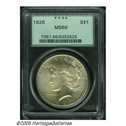 1926 S$1 MS66 PCGS. A thin veil of pastel-lemon p
