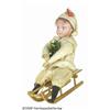 Image 1 : Boy on Sled with Tree Candy Container The contain