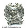 Image 1 : Hancock Diecut Metal Portrait Pin An extremely ra