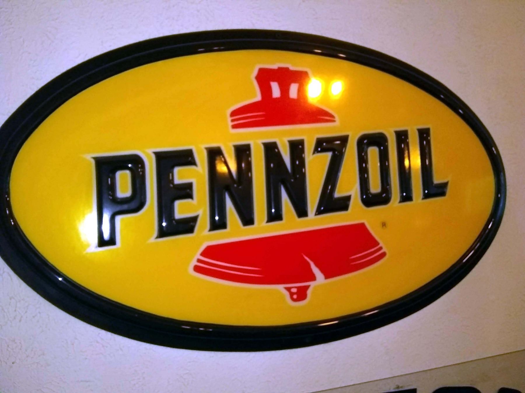 Vintage Pennzoil Embossed Resin Sign