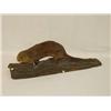 Image 1 :  FULL BODIED MOUNTED OTTER ON A BARKED WOODEN BAS