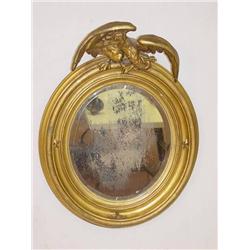  19TH CENT. GILT OVAL BEVELED MIRROR W/ CARVED EA