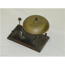 6" BRASS TAPPER BELL MOUNTED ON 8 1/2" X 5" WOODE