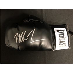 MIKE TYSON SIGNED BLACK EVERLAST BOXING GLOVE (JSA COA)