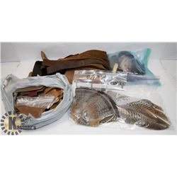 BOX OF LEATHER PIECES, BUCKLES, FEATHERS AND MORE.