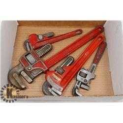 BOX W/ 4 RIDGID AND COMPANION PIPE WRENCHES.