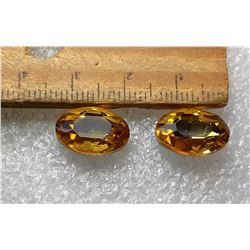 14)  LOT OF 2 MATCHED OVAL YELLOW CZ