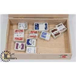 CIGAR BOX WITH 10 X 100 CANADIAN STAMPS.