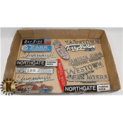 VINTAGE METAL CHROME AUTO DEALER BADGES.