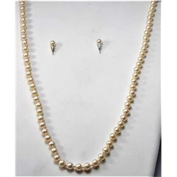 5)  CREAM COLORED 30" STRING OF FAUX