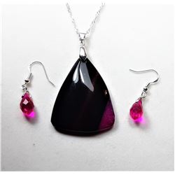 17)  SHIELD SHAPED BLACK & PINK DRAGON