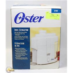 NEW OSTER JUICE EXTRACTOR.