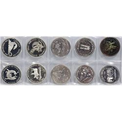 LOT OF 10 CANADIAN SILVER DOLLAR COINS.