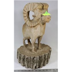 WOODEN GOAT SCULPTURE.