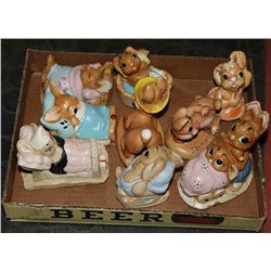 A HERD OF 9 BUNNY FIGURES.