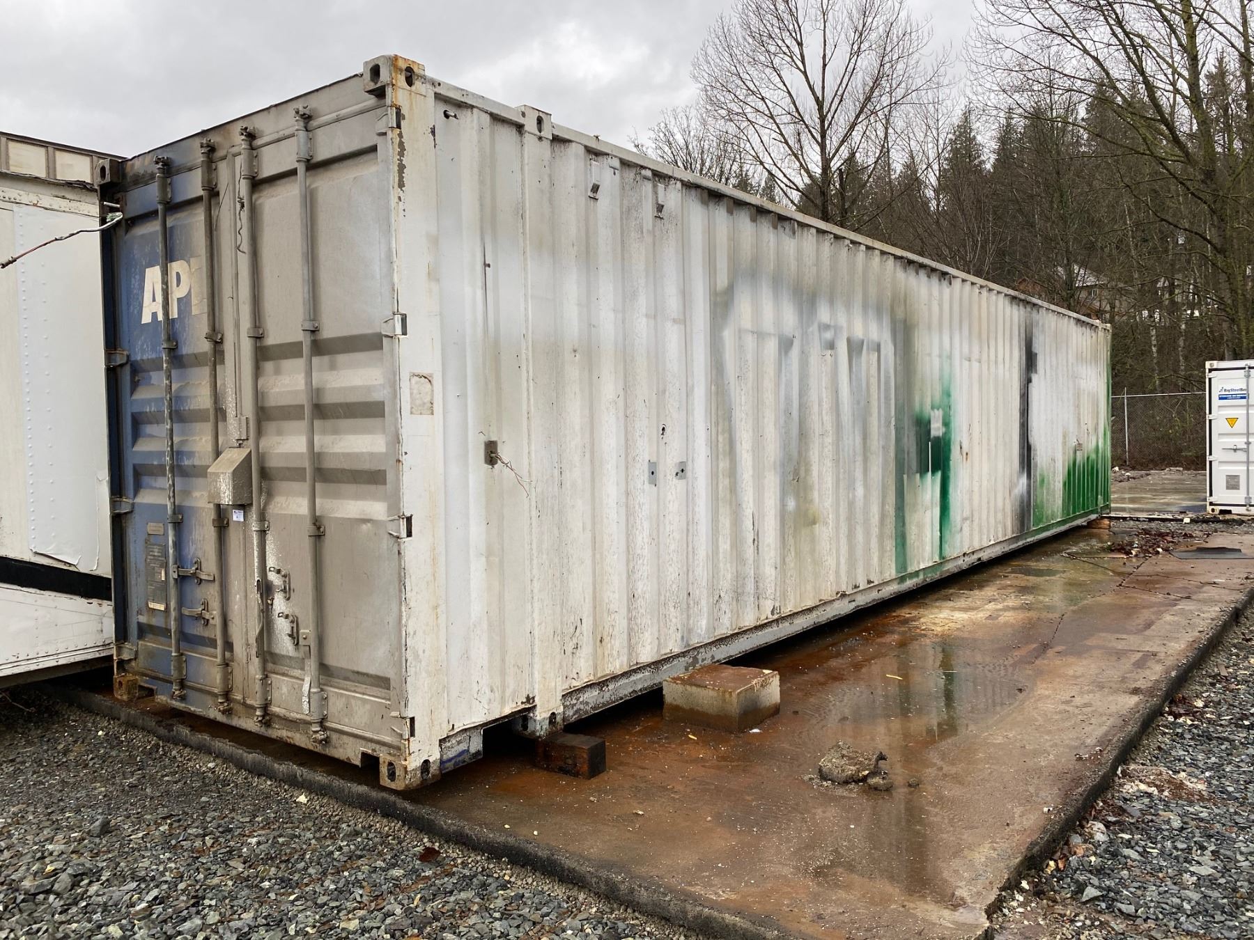 Shipping Container Partitial APPROX. 45' SHIPPING CONTAINER WITH PARTIAL CONVERSION AND SIDE DOOR