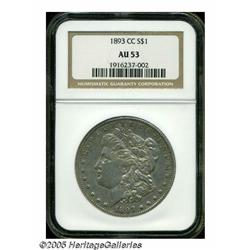 1893-CC S$1 AU53 NGC. Apricot grey covers the sur