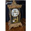 Image 1 : Gilded brass mantle clock made by The Ansonia Clock Company, New York with porcelain dial, Roman num