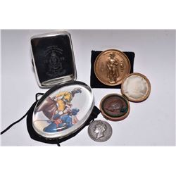 Selection of military collectibles including sterling silver British hallmarked cigarette case engra